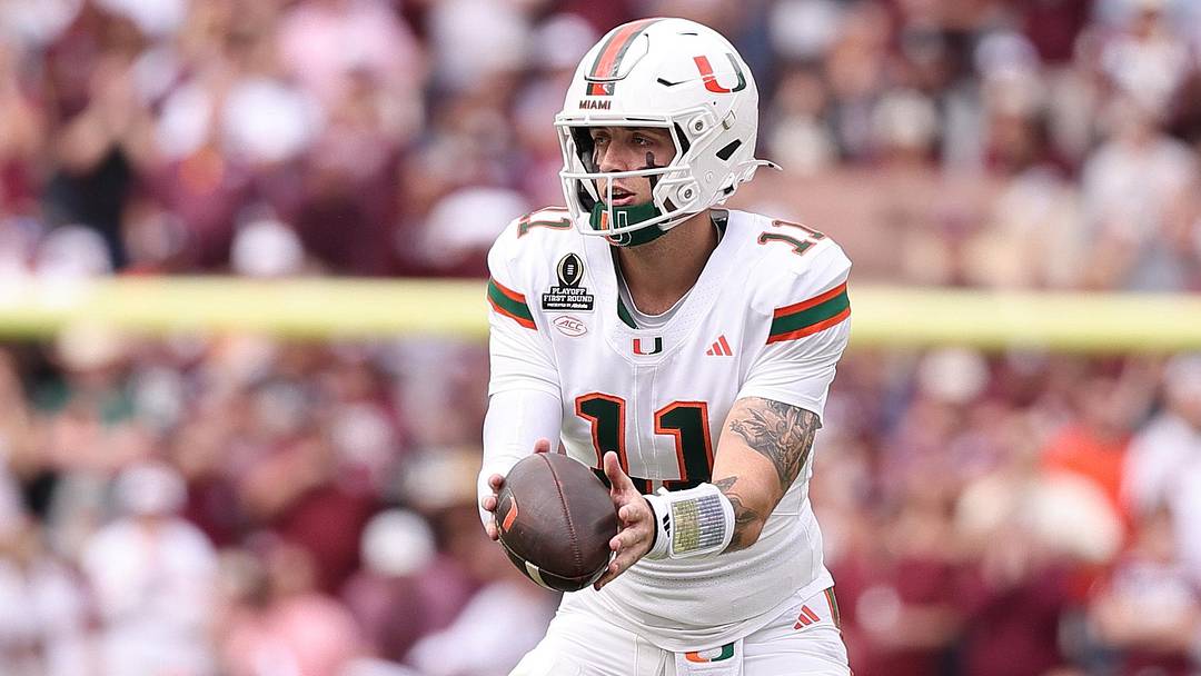 Dec 20, 2025; College Station, TX, USA; Miami Hurricanes quarterback Carson Beck (11) takes the snap against the Texas A&M Aggies during the second half of the first round game of the CFP National Playoff at Kyle Field. Mandatory Credit: Maria Lysaker-Imagn Images